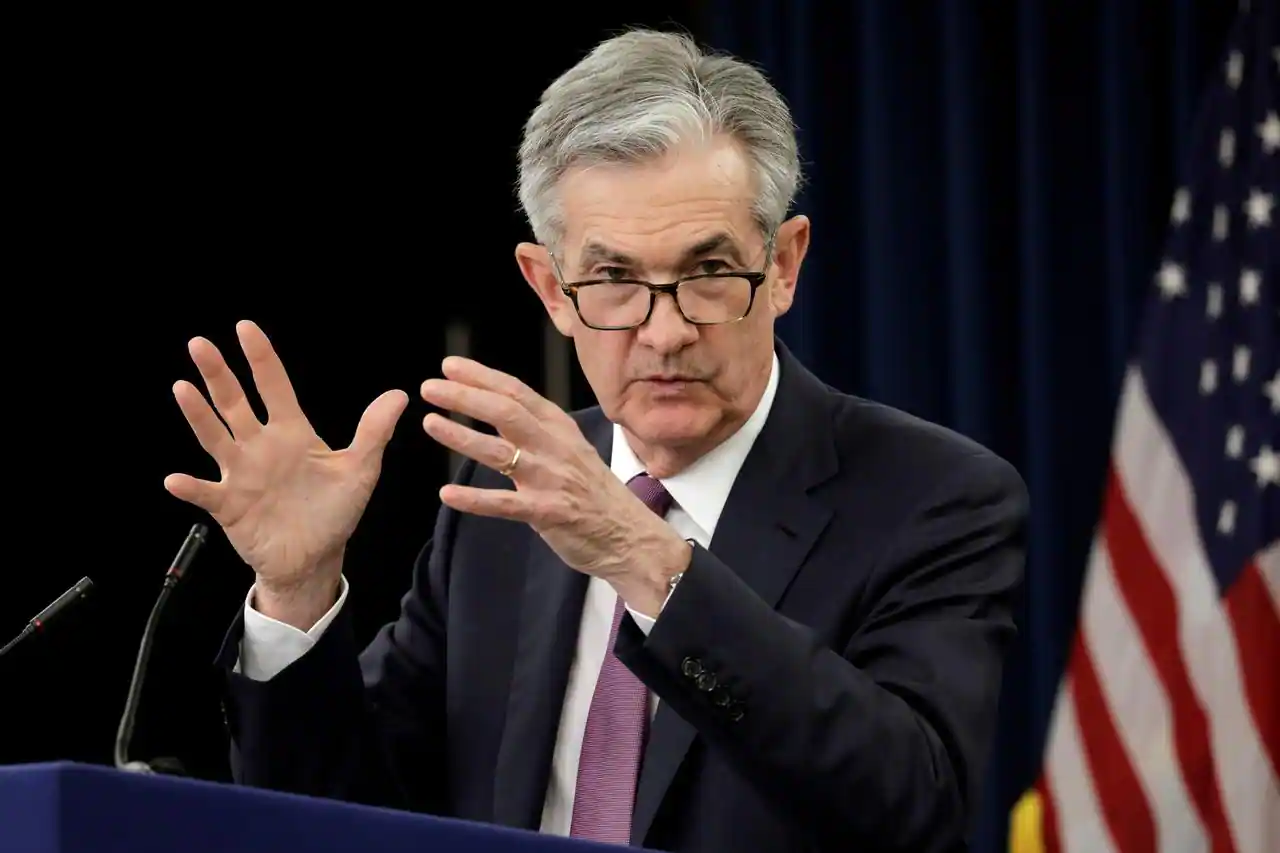 Fed touts economic recovery, vows to keep interest rates low