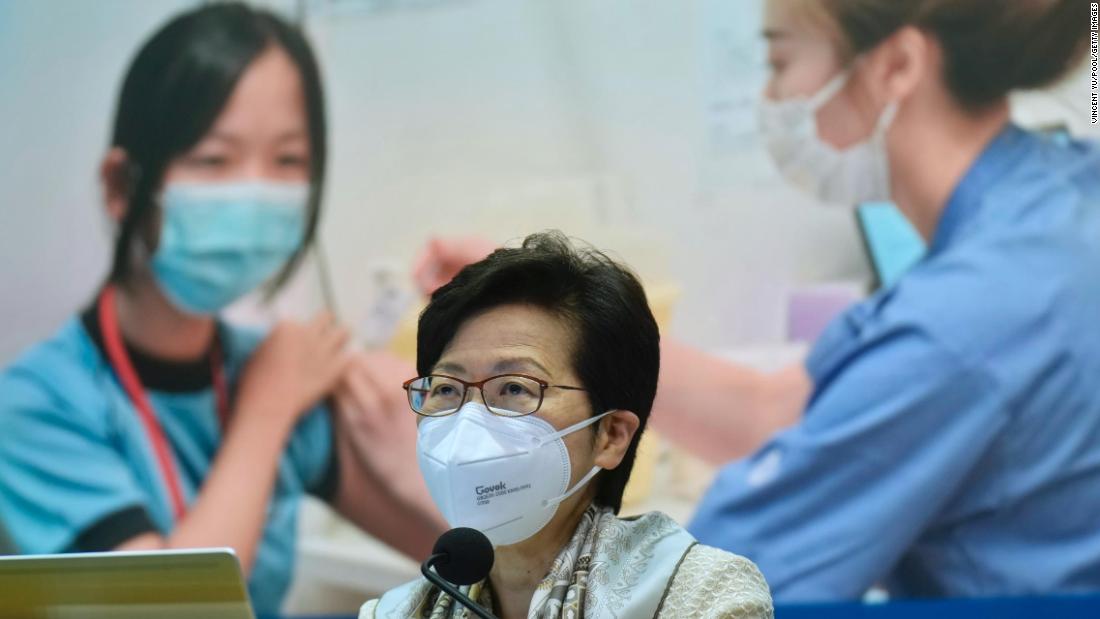 Hong Kong lifts flight bans, cuts quarantine to 'relaunch' economy
