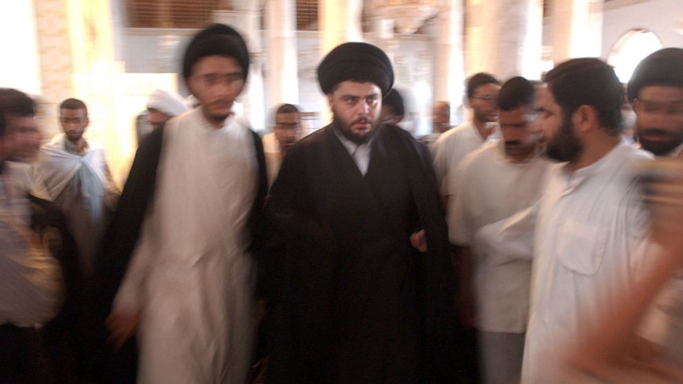 FILE - Muqtada al-Sadr is seen during prayers at the Al-Kufa Mosque Friday, July 18, 2003, in the holy city of Najaf, south of Baghdad, Iraq. Al-Sadr is a populist cleric, who emerged as a symbol of resistance against the U.S. occupation of Iraq afte